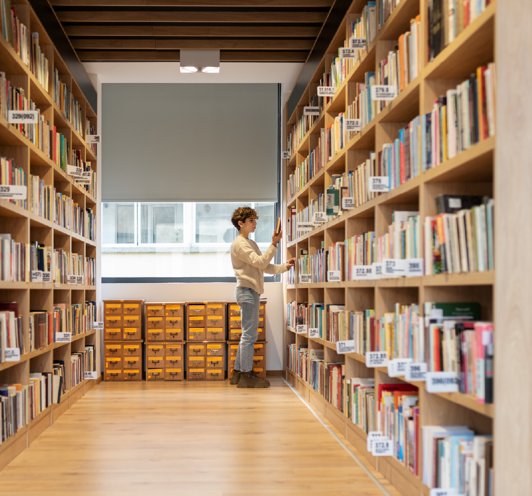 Modern library aisle with RFID-tagged shelves